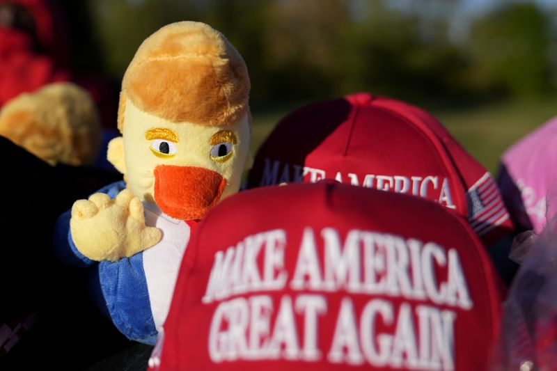 Merchandise is seen outside a Republican presidential nominee former President Donald Trump campaign event at Dane Manufacturing, Tuesday, Oct. 1, 2024, in Waunakee, Wis. (AP Photo/Charlie Neibergall)