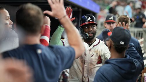 Atlanta Braves' Michael Harris II (23) celebrates after scoring in the sixth inning of a baseball game against the Colorado Rockies Wednesday, Sept. 4, 2024, in Atlanta. (AP Photo/Brynn Anderson)