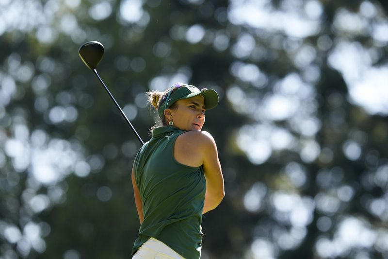 Lexi Thompson watches her shot after hitting from the 11th tee during the first round of the Women's PGA Championship golf tournament at Sahalee Country Club, Thursday, June 20, 2024, in Sammamish, Wash. (AP Photo/Gerald Herbert)