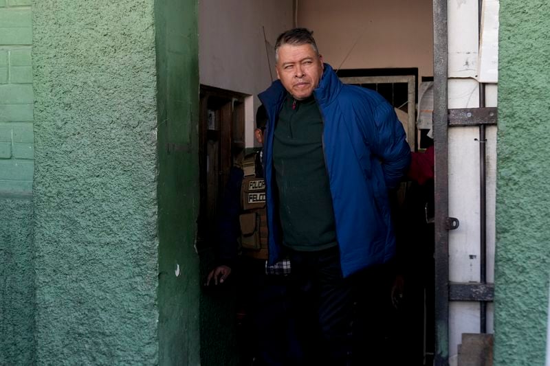 Juan Jose Zuniga, former commanding general of the Army, is escorted from a jail to be taken to Chonchocoro maximum security prison, in La Paz, Bolivia, Saturday, June 29, 2024. Zuniga was detained for his involvement in what President Luis Arce called a coup attempt. (AP Photo/Juan Karita)