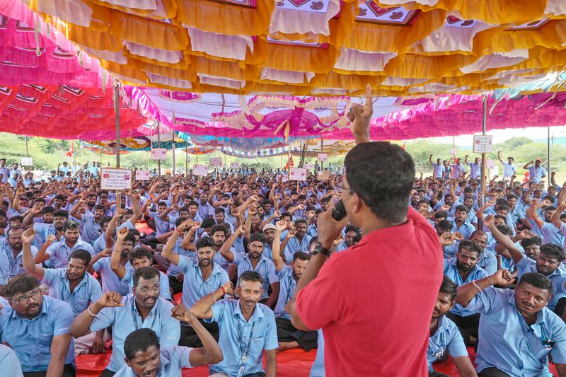 Samsung workers who are on strike shout slogans during a protest near their plant in Sriperumbudur, on the outskirts of Chennai, India, Tuesday, Sept. 24, 2024. (AP Photo/Mahesh Kumar A.)