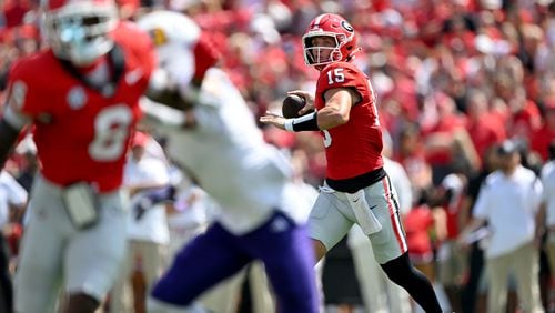 Georgia quarterback Carson Beck (15) gets off a pass during the first half in an NCAA football game at Sanford Stadium, Saturday, September 9, 2024, in Athens. Georgia won 48-3 over Tennessee Tech. (Hyosub Shin / AJC)