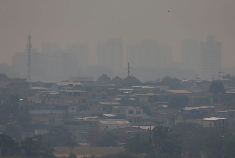 Smoke from wildfires fills the air in Manaus, Amazonas state, Brazil, Tuesday, Aug. 27, 2024. (AP Photo/Edmar Barros)