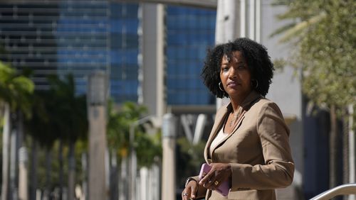 FILE - Ayana Parsons, one of the co-founders and CEOs of The Fearless Fund, walks outside the James Lawrence King Federal Building in Miami, Jan. 31, 2024, following a hearing. On Monday, June 24, 2024, Parsons, one of the co-founders of the Atlanta-based venture capital firm that supports women of color, stepped down as chief operating officer as the company battles a lawsuit that has become emblematic of a conservative backlash against corporate diversity programs. (AP Photo/Rebecca Blackwell, File)