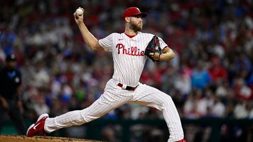 Philadelphia Phillies' Zack Wheeler throws during the third inning of a baseball game against the Atlanta Braves, Saturday, Aug. 31, 2024, in Philadelphia. (AP Photo/Derik Hamilton)