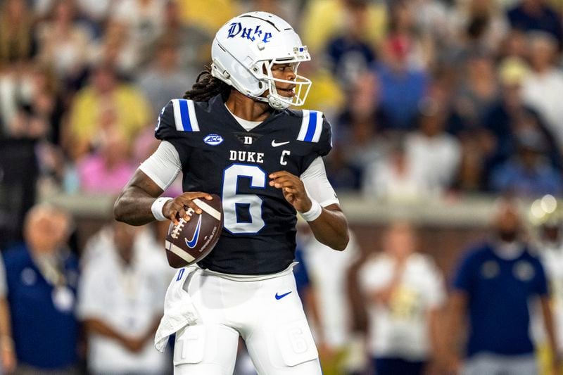 Duke Blue Devils quarterback Maalik Murphy (6) drops back to pass in the first quarter of a football game against the Georgia Tech Yellowjackets, Saturday, Oct. 5, 2024, in Atlanta. (AP Photo/Jason Allen)