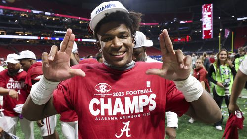 Alabama Crimson Tide defensive back Caleb Downs (2) celebrates as he walks off of the field after Alabama’s 27-24 win against Georgia during the SEC Championship football game at the Mercedes-Benz Stadium in Atlanta, on Saturday, December 2, 2023. (Jason Getz / Jason.Getz@ajc.com)