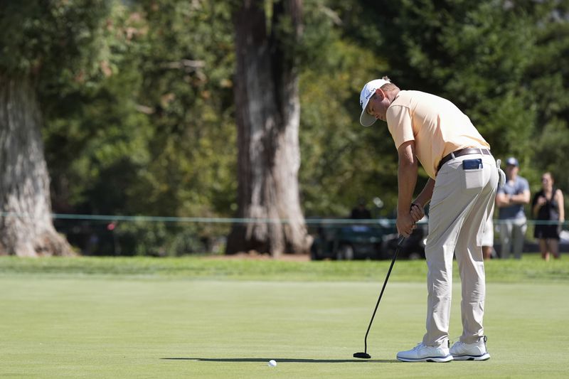 Patton Kizzire putts on the first green during the final round of the Procore Championship golf tournament at Silverado Resort North Course, Sunday, Sept. 15, 2024, in Napa, Calif. (AP Photo/Godofredo A. Vásquez)