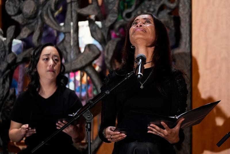 Kimberly Green, right, performs in "What Do I Do With All This Heritage?" on Wednesday, May 22, 2024, in Los Angeles. The show offers more than 14 true stories of Asian American Jews. Kaitlyn Tanimoto is at left. (AP Photo/Ashley Landis)