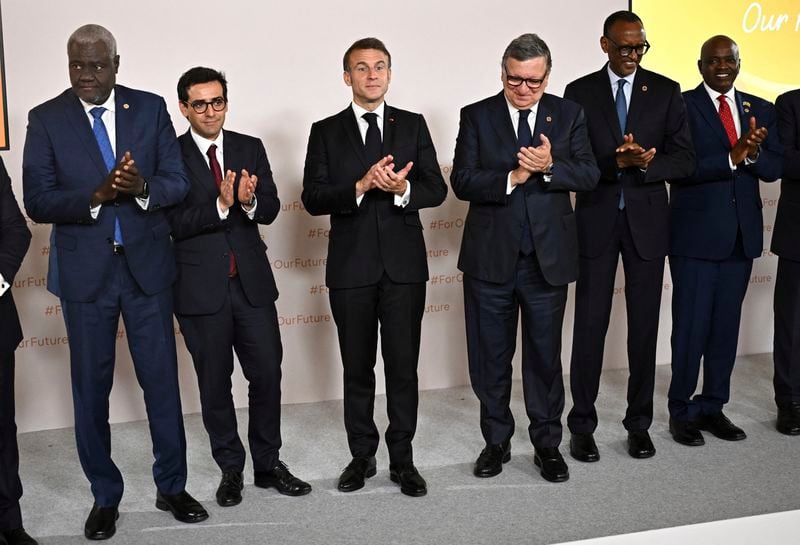 From the left, chairperson of the African Union Commission (AUC) Moussa Faki Mahamat, French Minister for Foreign and European Affairs Stephane Sejourne, French President Emmanuel Macron, Jose Manuel Barroso, former President of the European Commission and former Prime Minister of Portugal, Rwanda's President Paul Kagame, and Botswana's President Mokgweetsi Eric Keabetswe Masisi applaudduring the African Vaccine Manufacturing Accelerator conference, Thursday, June 20, 2024 in Paris. French President Emmanuel Macron is joining some African leaders to kick off a planned $1 billion project to accelerate the rollout of vaccines in Africa, after the coronavirus pandemic bared gaping inequalities in access to them. (Dylan Martinez/Pool via AP)