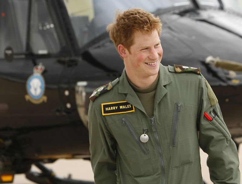 FILE - Britain's Prince Harry during a photo call at RAF (Royal Air Force) Shawbury in Shropshire, England, Thursday June 18, 2009. (AP Photo/Kirsty Wigglesworth, File)