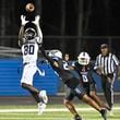 Norcross wide receiver Traemel Mitchell (80) goes up for and makes the reception during the Norcross at Peachtree Ridge GHSA region football game on Friday, Sept. 20, 2024, in Suwanee, GA. (Jim Blackburn for the AJC)