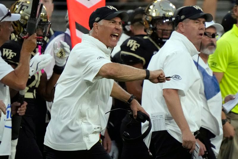 Wake Forest head coach Dave Clawson screams from the sidelines during the first half of an NCAA college football game against Mississippi in Winston-Salem, N.C., Saturday, Sept. 14, 2024. (AP Photo/Chuck Burton)