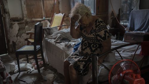 Margarita Salazar, 82, wipes the sweat off with a tissue inside her home amid high heat in Veracruz, Mexico, on June 16, 2024. Human-caused climate change intensified and made far more likely this month's killer heat with triple digit temperatures, a new flash study found Thursday, June 20. (AP Photo/Felix Marquez)