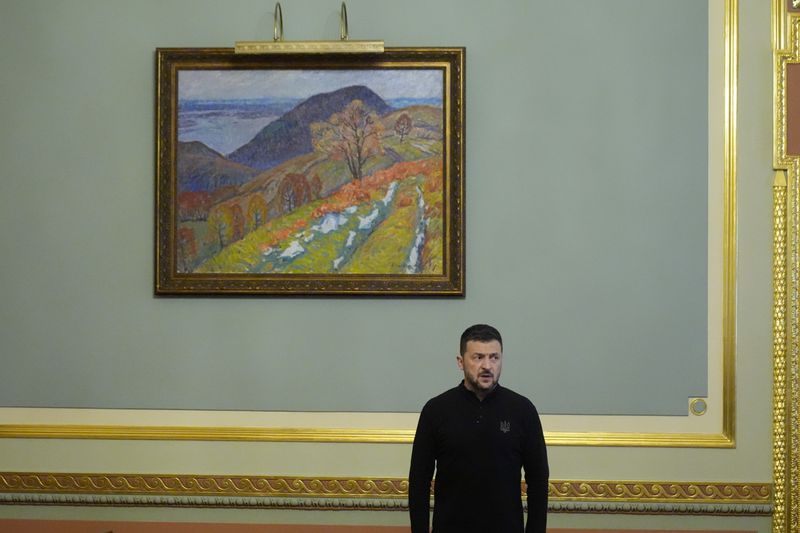 Ukraine's President Volodymyr Zelenskyy prepares to meet U.S. Secretary of State Antony Blinken and Britain's Foreign Secretary David Lammy at the Mariinsky Palace in Kyiv, Ukraine, Wednesday, Sept. 11, 2024. (AP Photo/Mark Schiefelbein, Pool)