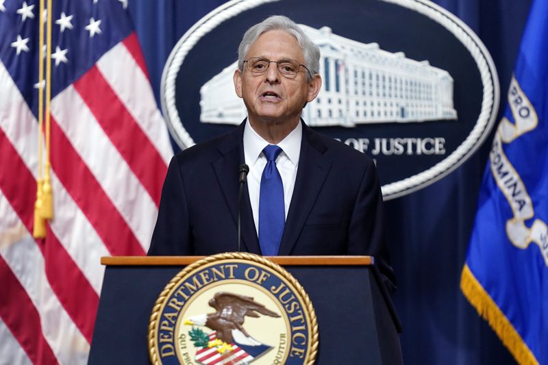 FILE - Attorney General Merrick Garland speaks at the Department of Justice, Aug. 11, 2023, in Washington. The Justice Department has charged nearly 200 people in a sweeping crackdown on health care fraud schemes nationwide with false claims topping $2.7 billion. Garland announced the charges Thursday, June 27, 2024, against doctors, nurse practitioners and others across the U.S. accused of a variety of scams, including a $900 million scheme in Arizona targeting dying patients. (AP Photo/Stephanie Scarbrough, File)