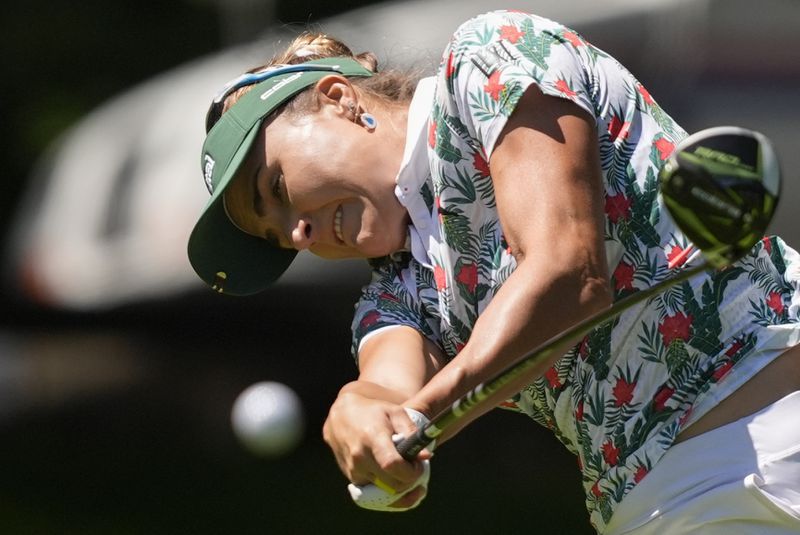 Lexi Thompson hits from the sixth tee during the second round of the Women's PGA Championship golf tournament at Sahalee Country Club, Friday, June 21, 2024, in Sammamish, Wash. (AP Photo/Gerald Herbert)