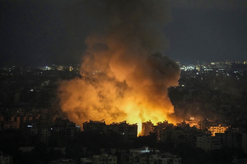 Flames and smoke rise from an Israeli airstrike in Dahiyeh, Beirut, Lebanon, Sunday, Oct. 6, 2024. (AP Photo/Bilal Hussein)