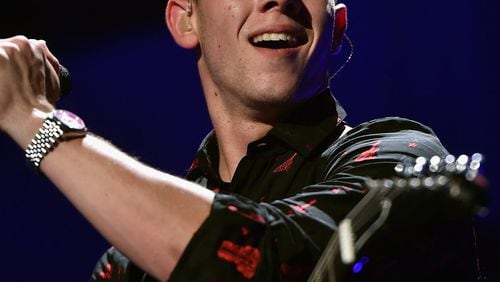 Nick Jonas and his abs will be at The Tabernacle on Friday. Photo: Getty Images.