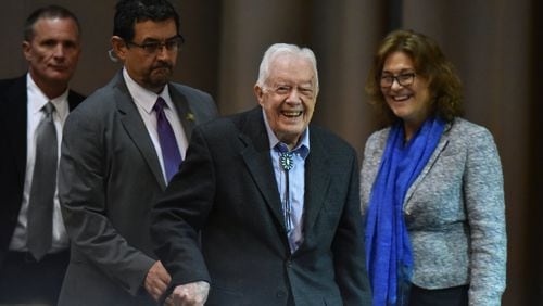 Former President Jimmy Carter with Karin Ryan, the Carter Center’s senior policy adviser for human rights, at this month’s 12th Human Rights Defenders Forum at the Carter Center on Tuesday, October 15, 2019. Carter has been walking with a cane since breaking his hip in May. On Monday, he fell and fractured his pelvis. (Hyosub Shin / Hyosub.Shin@ajc.com)