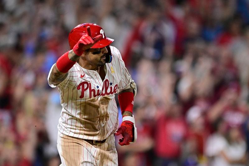 Philadelphia Phillies' Nick Castellanos reacts after hitting a walk off single against Atlanta Braves' Grant Holmes during the 11th inning of a baseball game, Sunday, Sept. 1, 2024, in Philadelphia. (AP Photo/Derik Hamilton)