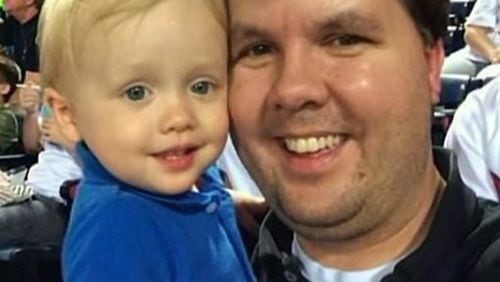 Ross Harris and his son Cooper take in a Braves game. (Facebook photo)