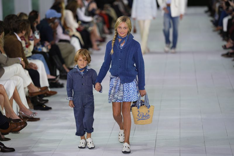 Models walk the runway during the Ralph Lauren Spring/Summer 2025 fashion show as part of New York Fashion Week on Thursday, Sept. 5, 2024, at Khalily Stables in Bridgehampton, N.Y. (Photo by Charles Sykes/Invision/AP)