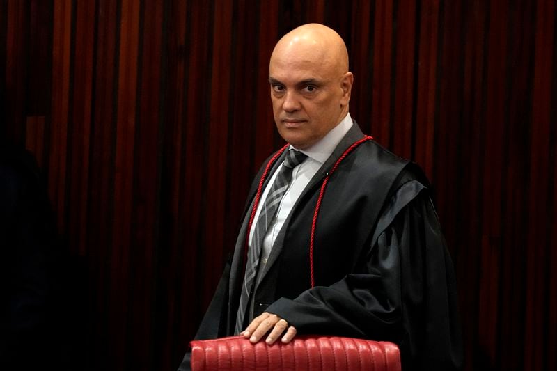 FILE - Brazilian Supreme Court Chief Justice Alexandre de Moraes arrives for a court hearing, in Brasilia, Brazil, June 22, 2023. (AP Photo/Eraldo Peres, File)