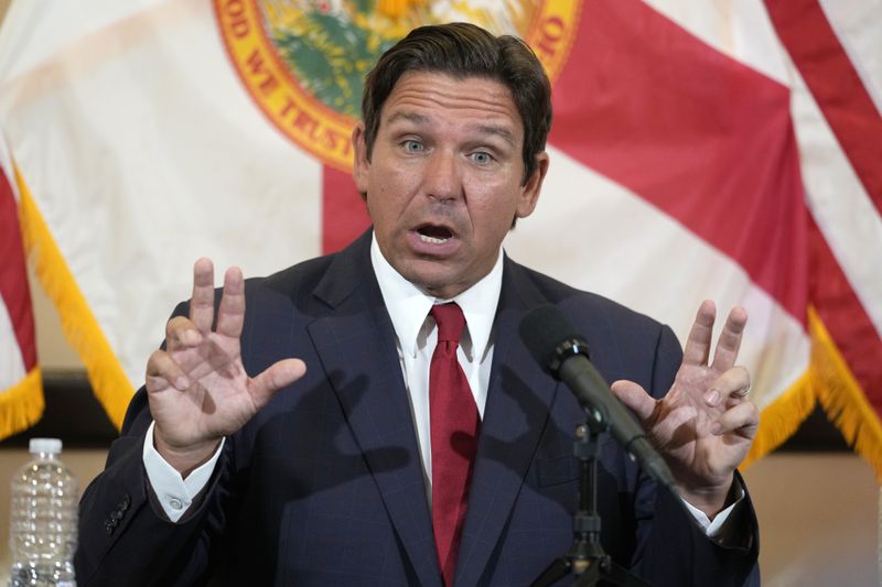 Florida Gov. Ron DeSantis gestures as he answers questions after a roundtable discussion at the Roberto Alonso Community Center, Monday, Sept. 9, 2024, in Miami Lakes, Fla. (AP Photo/Wilfredo Lee)