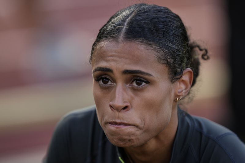 Sydney McLaughlin-Levrone reacts to winning the women's 400-meter hurdles final during the U.S. Track and Field Olympic Team Trials, Sunday, June 30, 2024, in Eugene, Ore. (AP Photo/Charlie Neibergall)