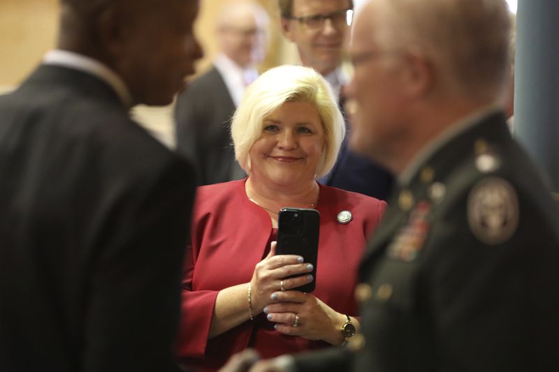 South Carolina Sen. Penry Gustafson, R-Camden, records as senators come to meet her husband on Wednesday, June 26, 2024, in Columbia, S.C. Gustafson and the two other Republican women Sister Senators were all voted out in their party's primary. (AP Photo/Jeffrey Collins)