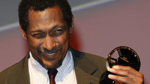 FILE - U.S. writer Percival Everett holds his trophy after he was awarded with the Literary Award at the 38th American Film Festival Sept. 5, 2012, in Deauville, Normandy, France. (AP Photo/Michel Spingler, File)