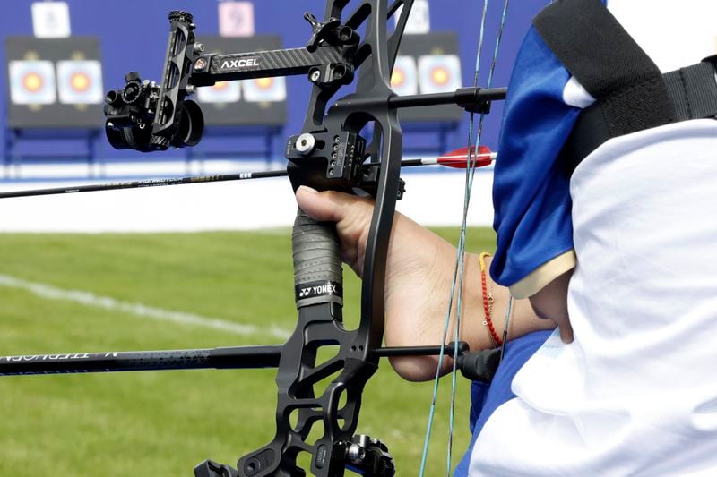 Sheetal Devi from India holds her bow during the Paralympic Games in Paris on Thursday, Aug. 29, 2024. (AP Photo/Felix Scheyer)