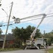 A Dominion Energy lineman works on a power line on Sept. 29 in the aftermath of Hurricane Helene in North Augusta, S.C. (Artie Walker Jr./AP)