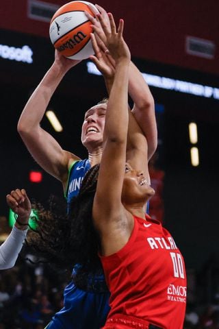 Atlanta Dream forward Naz Hillmon (right) fights for a rebound against Minnesota Lynx forward Alanna Smith during the second half at Gateway Center Arena, Sunday, May 26, 2024, in Atlanta. (Miguel Martinez / AJC)