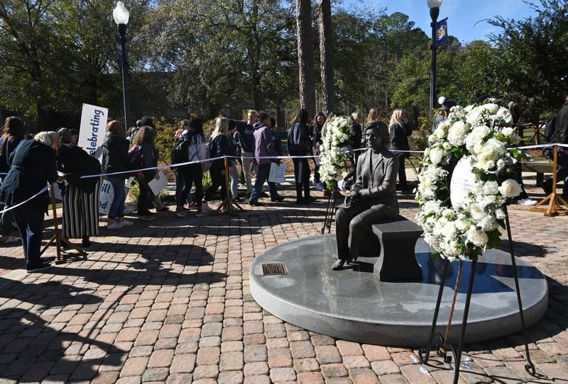 Mourners attend a wreath-laying ceremony at the Rosalynn Carter Health & Human Services Complex at Georgia Southwestern State University, Monday, November 27, 2023, in Americus. (Hyosub Shin / Hyosub.Shin@ajc.com)