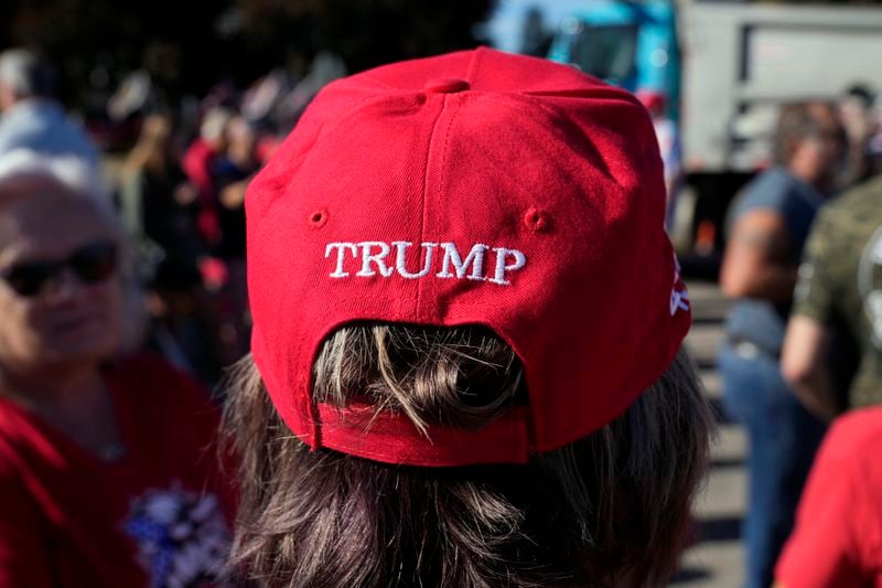 A supporter waits for Republican presidential nominee former President Donald Trump to arrive at a rally, Saturday, Sept. 28, 2024, in Prairie du Chien, Wis. (AP Photo/Charlie Neibergall)