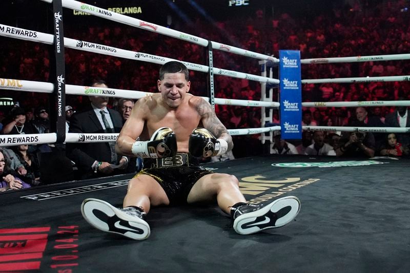 Edgar Berlanga reacts after he was knocked down by Canelo Alvarez in a super middleweight title bout Saturday, Sept. 14, 2024, in Las Vegas. (AP Photo/John Locher)