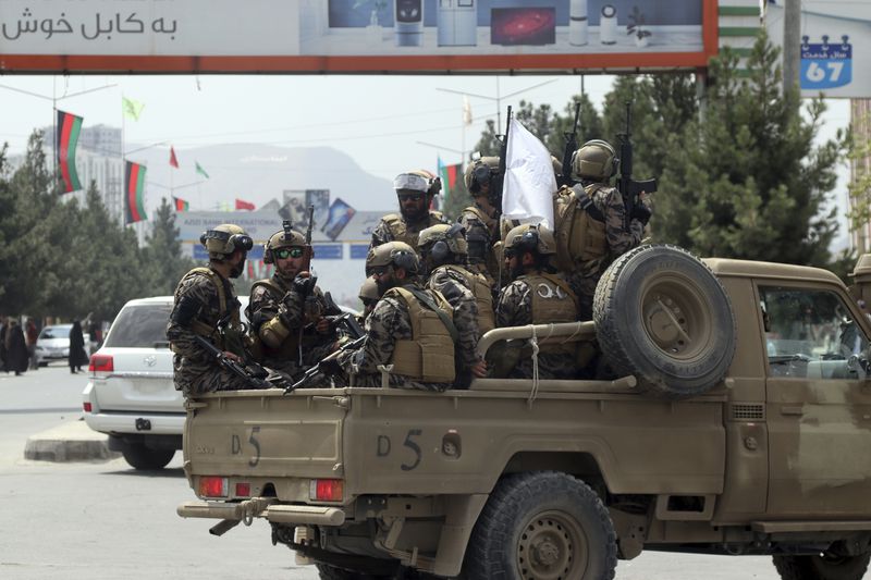 FILE - Taliban special force fighters arrive inside the Hamid Karzai International Airport after the U.S. military's withdrawal, in Kabul, Afghanistan, Aug. 31, 2021. (AP Photo/Khwaja Tawfiq Sediqi, File)