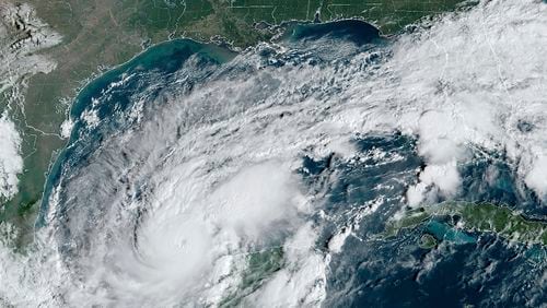 This satellite image provided by the National Oceanic and Atmospheric Administration on Monday, Oct. 7, 2024, shows Hurricane Milton. (NOAA via AP)