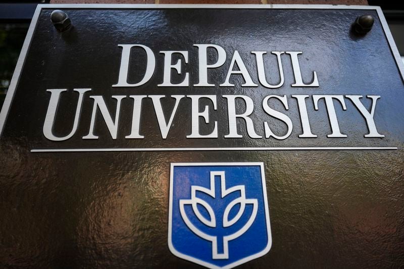 The DePaul University logo is seen outside of a dormitory in Chicago, Wednesday, Aug. 28, 2024. (AP Photo/Nam Y. Huh)