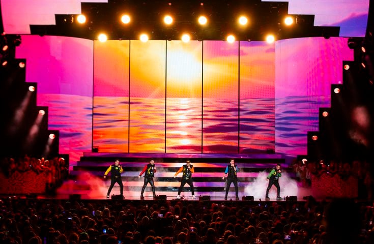 New Kids on the Block cranked out the hits to a packed house of neon clad fans at Ameris Bank Amphitheatre in Alpharetta on Friday, July 26, 2024. (RYAN FLEISHER FOR THE ATLANTA JOURNAL-CONSTITUTION)