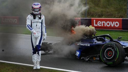 Williams driver Logan Sargeant of the US walks away from his car after he crashed during the third free practice ahead of the Formula One Dutch Grand Prix race at the Zandvoort racetrack, Netherlands, Saturday, Aug. 24, 2024. (AP Photo/Peter Dejong)