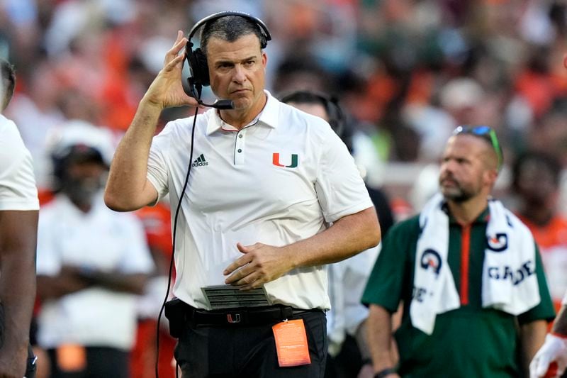 Miami head coach Mario Cristobal watches from the sideline during the first half of an NCAA football game against Florida A&M, Saturday, Sept. 7, 2024, in Miami Gardens, Fla. (AP Photo/Lynne Sladky)