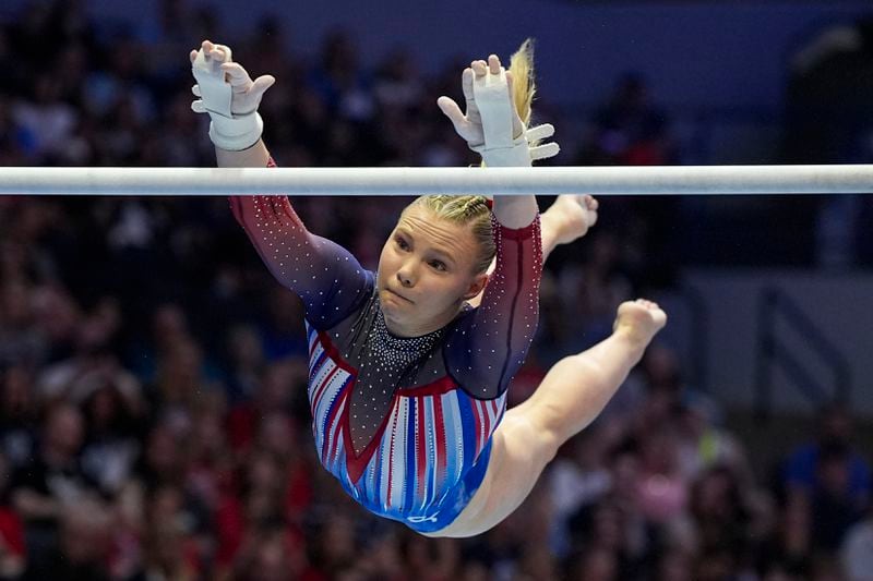 Jade Carey competes on the uneven bars at the United States Gymnastics Olympic Trials on Sunday, June 30, 2024, in Minneapolis. (AP Photo/Abbie Parr)