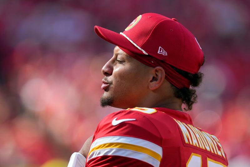 Kansas City Chiefs quarterback Patrick Mahomes watches from the sidelines during the second half of an NFL preseason football game against the Detroit Lions Saturday, Aug. 17, 2024, in Kansas City, Mo. (AP Photo/Ed Zurga)