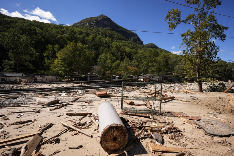 Debris is seen in the aftermath of Hurricane Helene, Wednesday, Oct. 2, 2024, in Chimney Rock Village, N.C. (AP Photo/Mike Stewart)