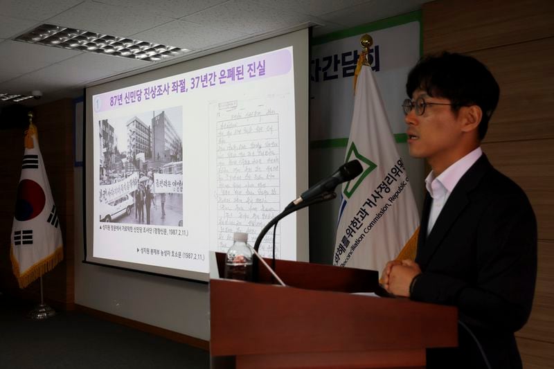 Ha Kum Chul, one of the Truth and Reconciliation Commission's investigators, speaks to the media during a news conference at the commission in Seoul, South Korea, Monday, Sept. 9, 2024. (Im Hwa-young/Yonhap via AP)