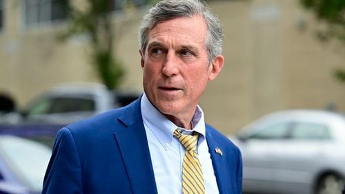 FILE - Delaware Gov. John Carney exits Vice President Kamala Harris campaign headquarters, July 22, 2024, in Wilmington, Del., after Harris addressed staff members. (AP Photo/Derik Hamilton, File)