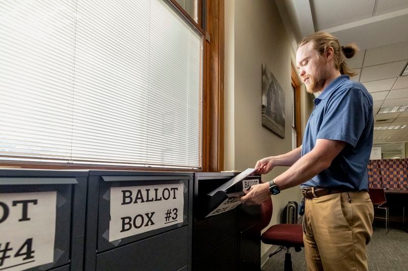 Trey Forrest, Absentee Election Coordinator for the Jefferson County/Birmingham (Ala) Division, demonstrates in-person absentee ballot voting for the November election, Tuesday, Sept. 10, 2024, in Birmingham, Ala. (AP Photo/Vasha Hunt)